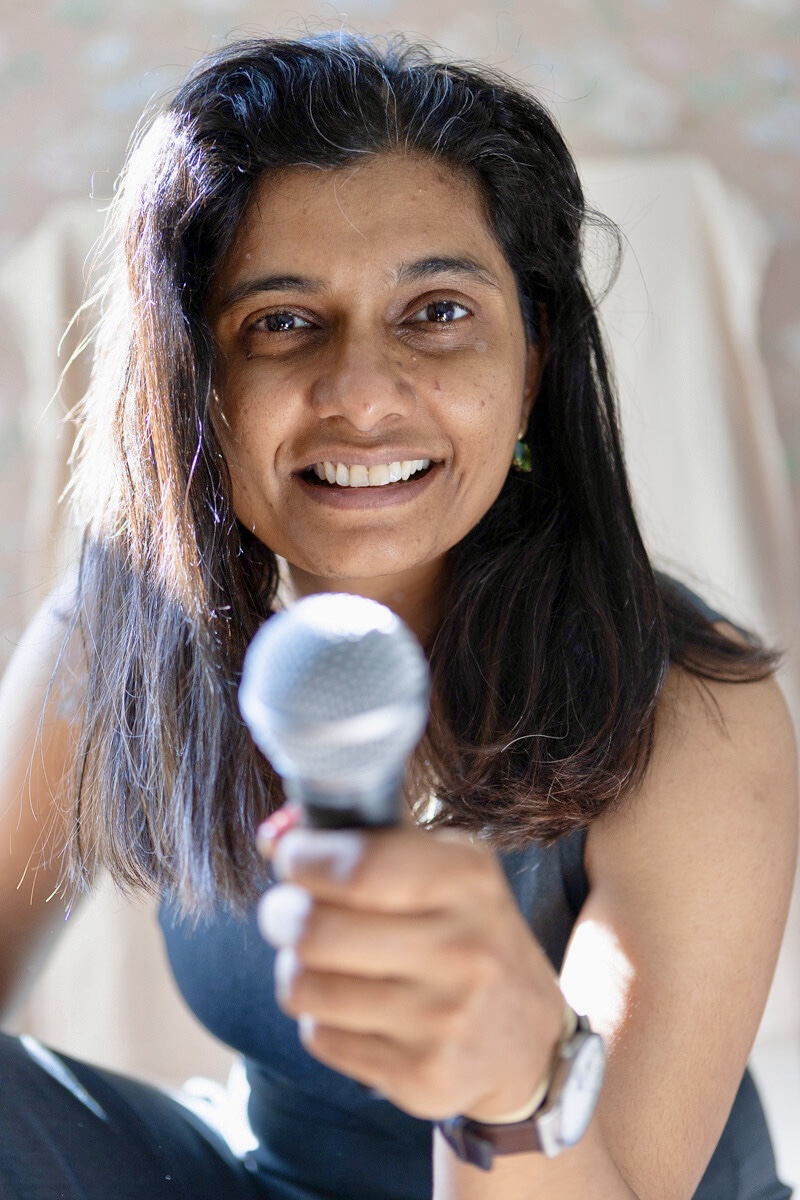Dr. Pranoti Kshirsagar with a microphone